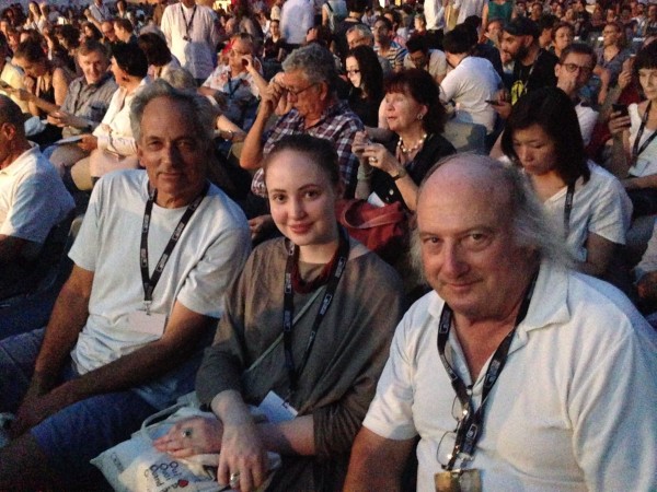 From left to right: SFTV Dean Stephen Ujlaki, alum Grace Heidig and Professor Rick Hadley enjoy an outdoor screening of "Rocco and His Brothers" (1960).