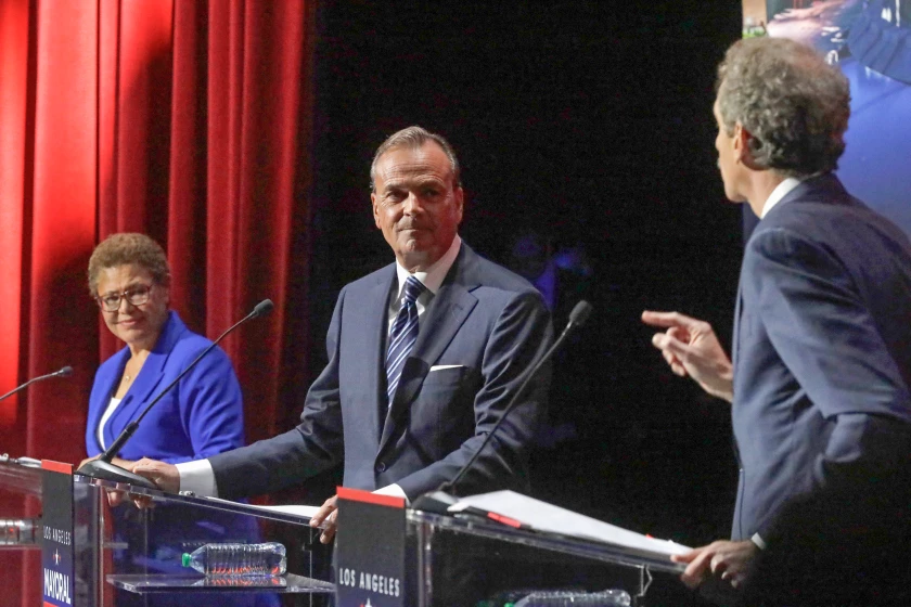 Rick Caruso (center)