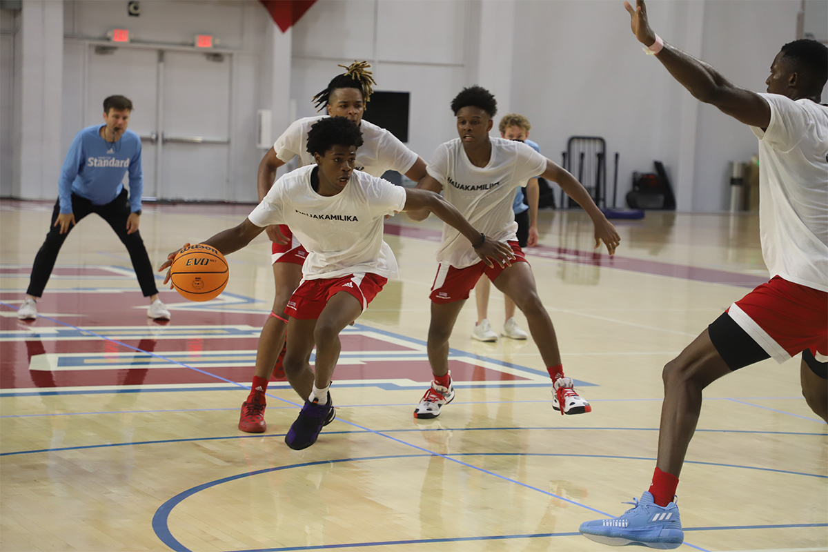 Image of men's basketball players practicing