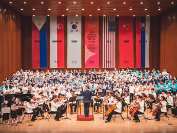 Image of T.J. Harper directing a chorus