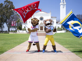 Iggy and Rampage waiving flags to announce partnership