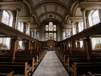 ONDON, ENGLAND - MAY 17: The reverend Lucy Winkett, rector of St James's Piccadilly, delivers a service on Rogation Sunday via webcam to the church's congregation while the pews remain empty on May 17, 2020 in London, England. As part of the national lockdown to prevent the spread of the COVID-19 coronavirus, places of worship are temporarily closed, with the rules preventing religious leaders from delivering services from within the buildings. Having resorted to delivering services from the rectory, Reverend Winkett has now returned to the church when addressing her congregation. Technical issues remain a problem with the steep learning curve involved in live broadcasting leading to today's service having to lose all of the pre-recorded readings. However, the wish to address the people in need of support outweighs the desire for perfection in the broadcast, resulting in a slightly shorter broadcast than planned. The prime minister announced the general contours of a phased exit from the current lockdown, adopted nearly two months ago in an effort curb the spread of Covid-19. (Photo by Leon Neal/Getty Images)