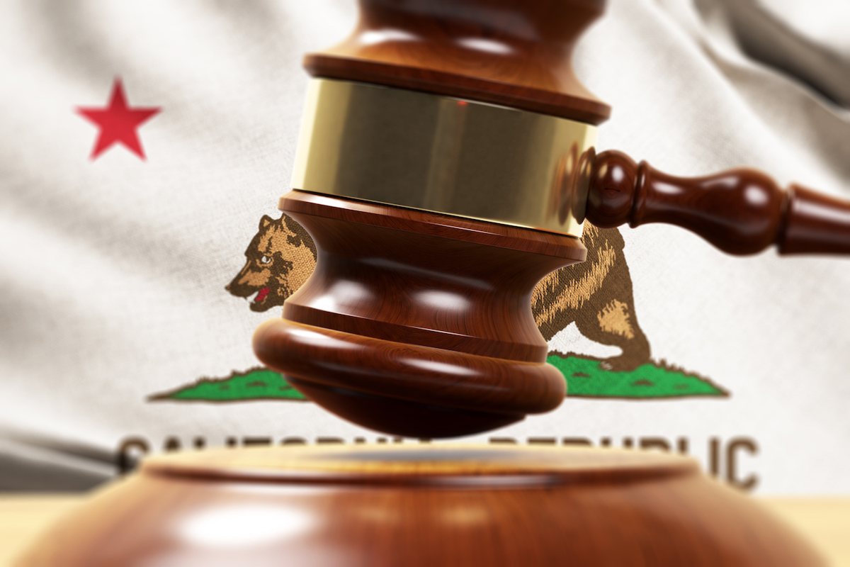 Wood Gavel Standing Front Of the California State Flag Closeup 3d Render Focused image