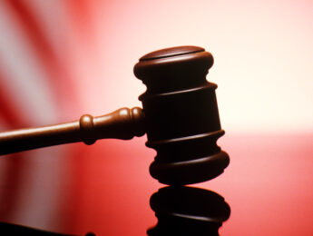 gavel with American flg in the background