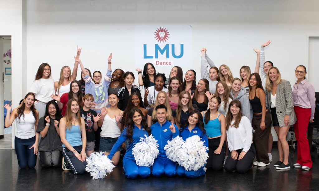 LMU dance majors and minors pose with Los Angeles Rams Cheerleaders Lily Lawsin, Eswinn Diaz, and Miranda Kotero
