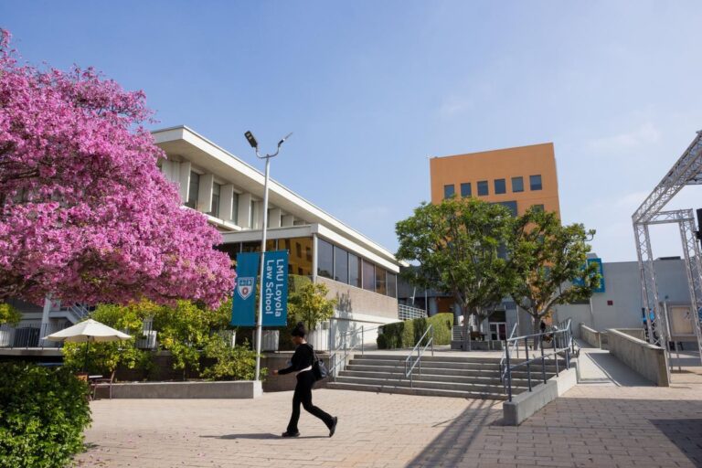 Student walks across LMU Loyola Law School campus