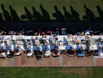 An overhead aerial shot of the Longest Table event on Sunken Garden where participants enjoyed a meal.
