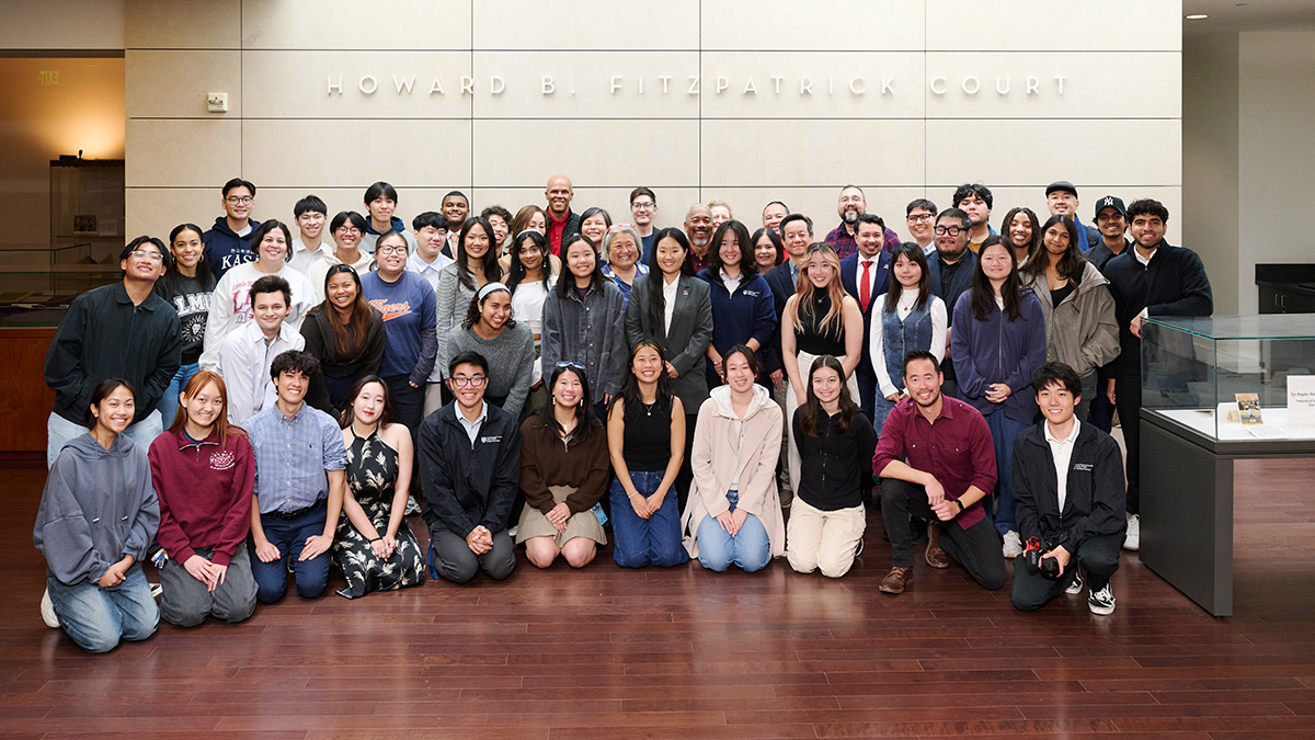 A large group of students, staff, staff, faculty and alumni gather to celebrate the 45th anniversary of Asian Pacific Student Services.