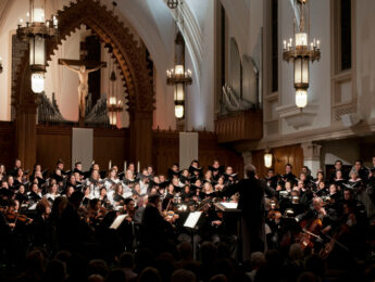 Chorale performs inside a church