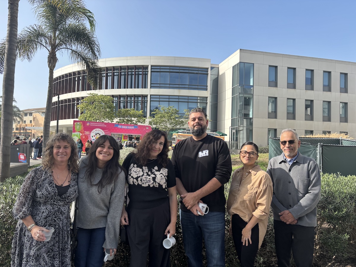 Evelyn McDonnell with (Every Day Is) Taco Tuesday panelists (from left to right): McDonnell, Brittny Mejia (Los Angeles Times), Mandalit del Barco (NPR), Memo Torres (L.A. TACO), Yanira Lemus (Loyola Immigration Law Clinic), and Rubén Martínez (LMU) outside with Taco Trucks in the background.