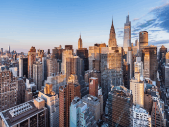 Buildings in the New York City skyline at dusk