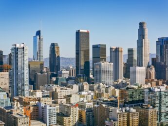 Aerial view of office buildings against blue sky in City Of Los Angeles, California, USA.