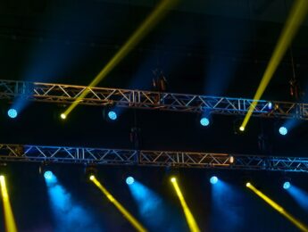 Stage spotlights during music performance.
