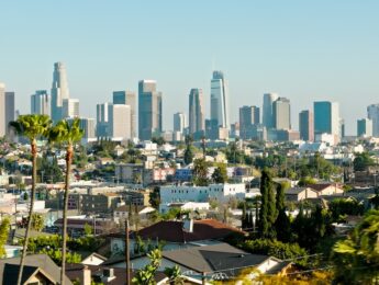 Aerial shot of the downtown Los Angeles skyline from over Silver Lake on a sunny day in Spring.