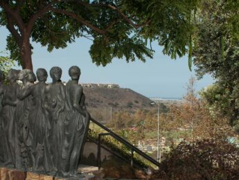 Photo of a statue of nice muses in a garden overlooking the bluff