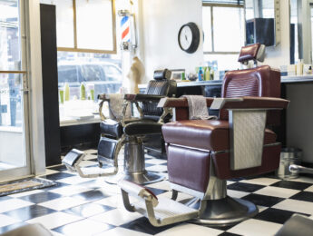 Empty chairs in retro barbershop