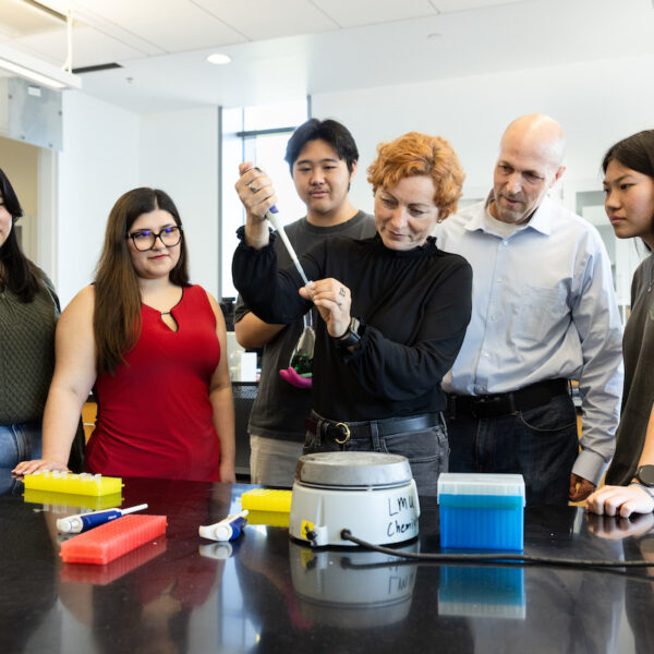 Seaver Professor David Moffet with students and MSMU Prof. Luiza Nogaj in laboratory