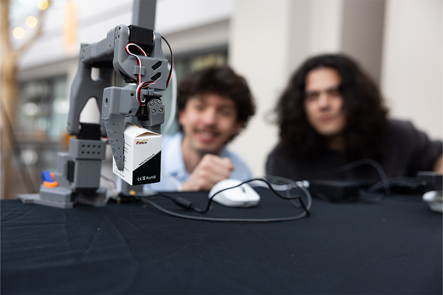 robotic arm poster presentation at Design Showcase 2026