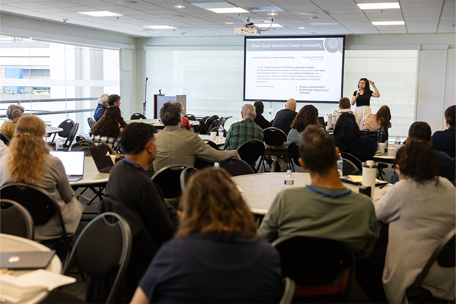 Speaker presenting at AI and Indigenous Language Revitalization Workshop at LMU