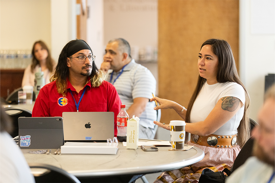 Participants talking at AI and Indigenous Language Revitalization Workshop at LMU