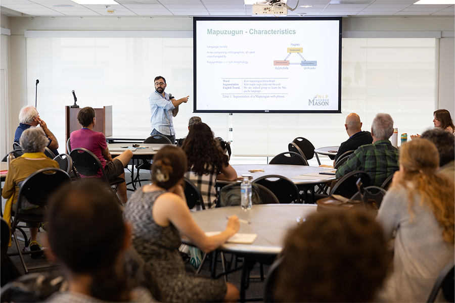 Speaker presenting at AI and Indigenous Language Revitalization Workshop at LMU