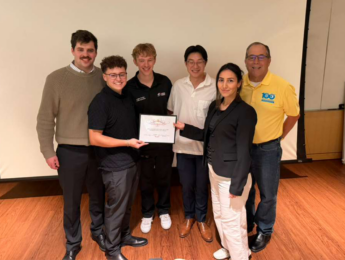 LMU mechanical engineering students holding third place certificate for American Society of Materials (ASM) Student Night in LA.
