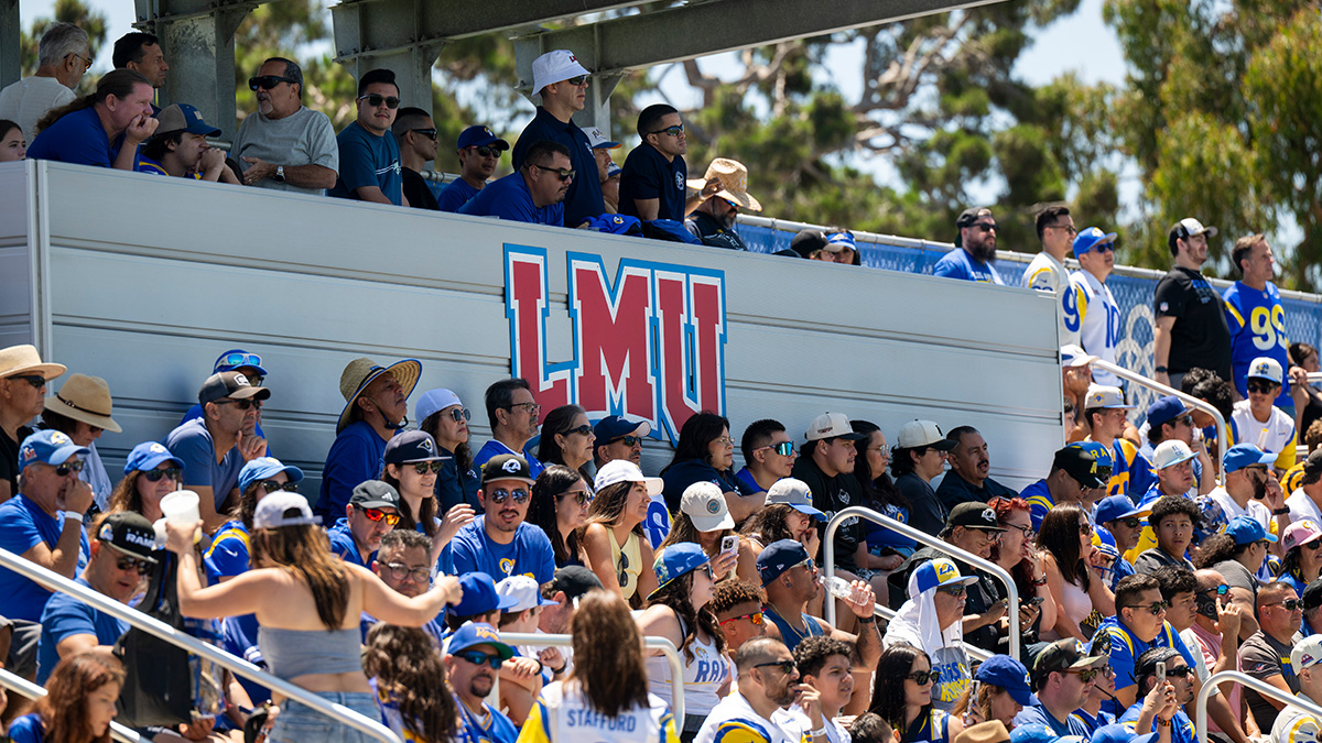 Rams fans sit in the LMU stands watching training camp open practice