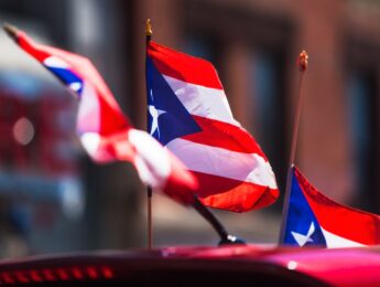 puerto rican flags on car at parade