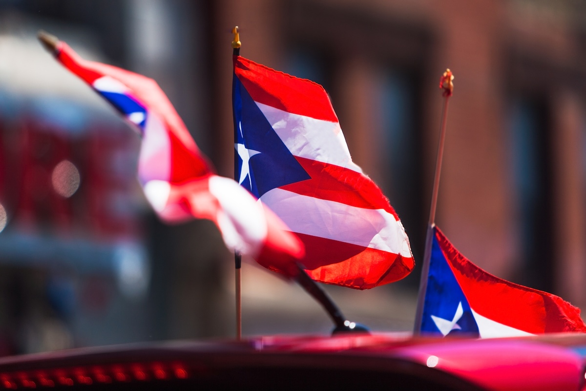 puerto rican flags on car at parade