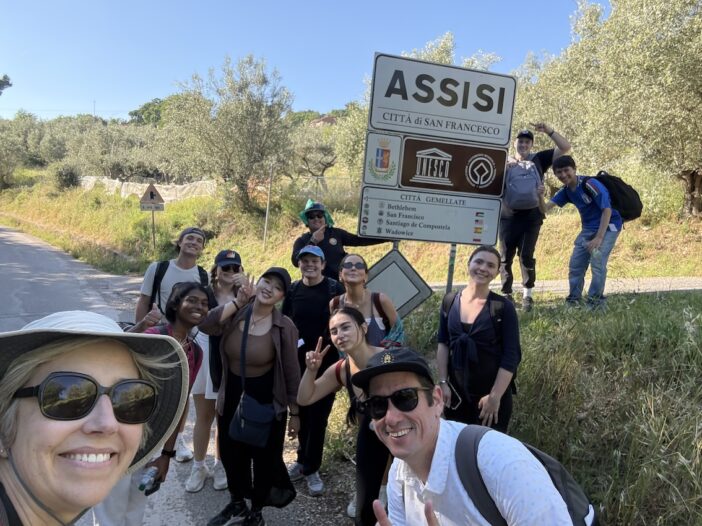Students and faculty outdoors on the Via di Francesco