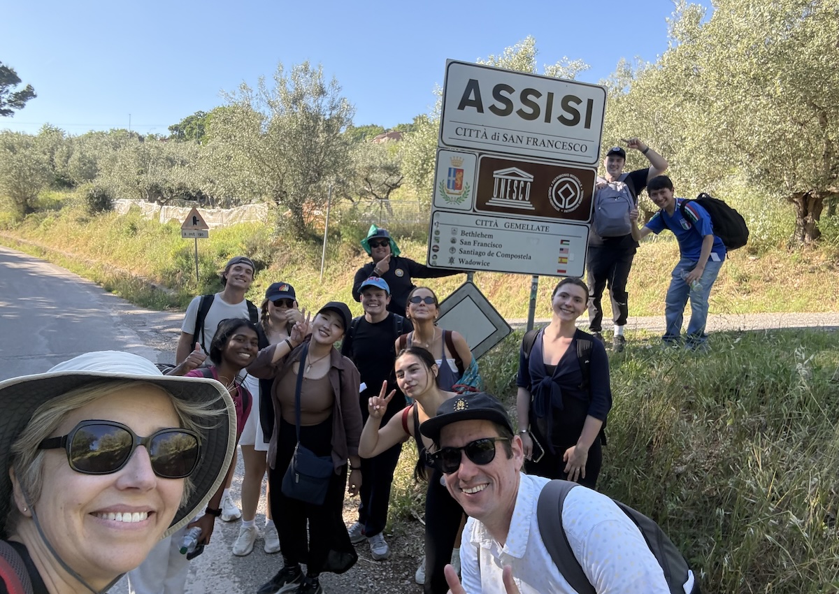 Students and faculty outdoors on the Via di Francesco