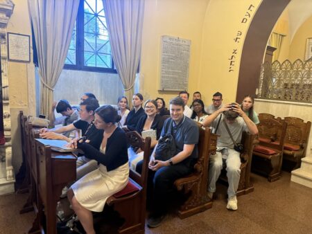 Students in a synagogue at the Jewish Museum of Rome