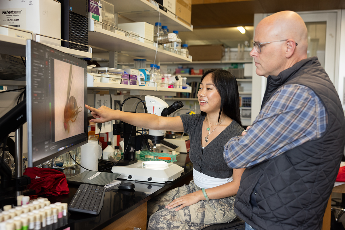 Biology student Faith Brooks with Professor Cory Evans