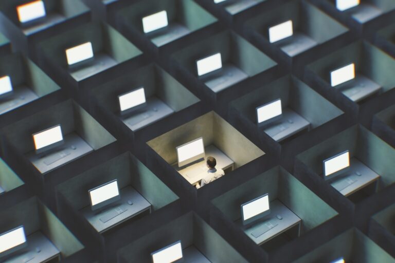 Surreal image of office cubicles with man working late. 3D generated image.