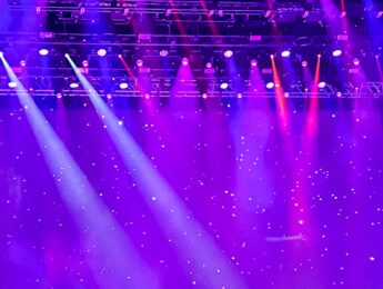 Pink Light Smoke and Confetti at a concert