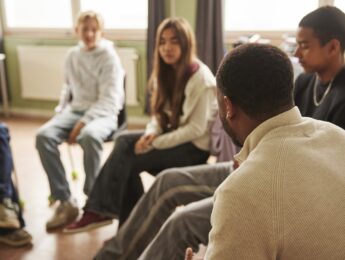 School counselor in session with students