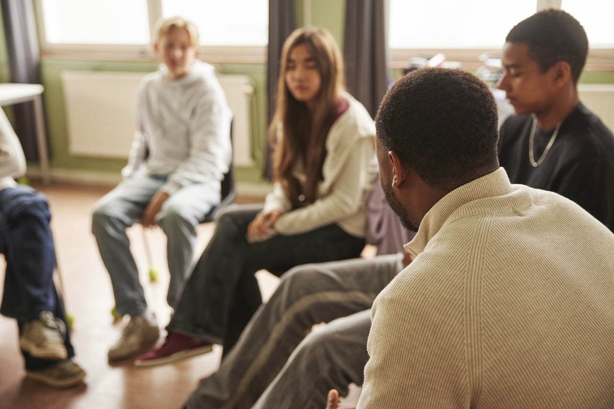 School counselor in session with students