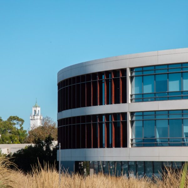 Photo of LMU William H. Hannon Library with the Sacred Heart Chapel in the Background