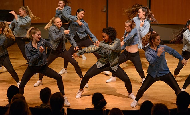 Dance team performing on stage
