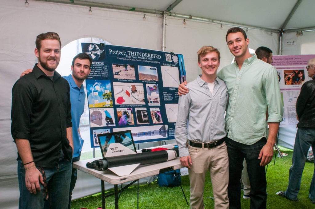 Seaver students and their Capstone Project poster