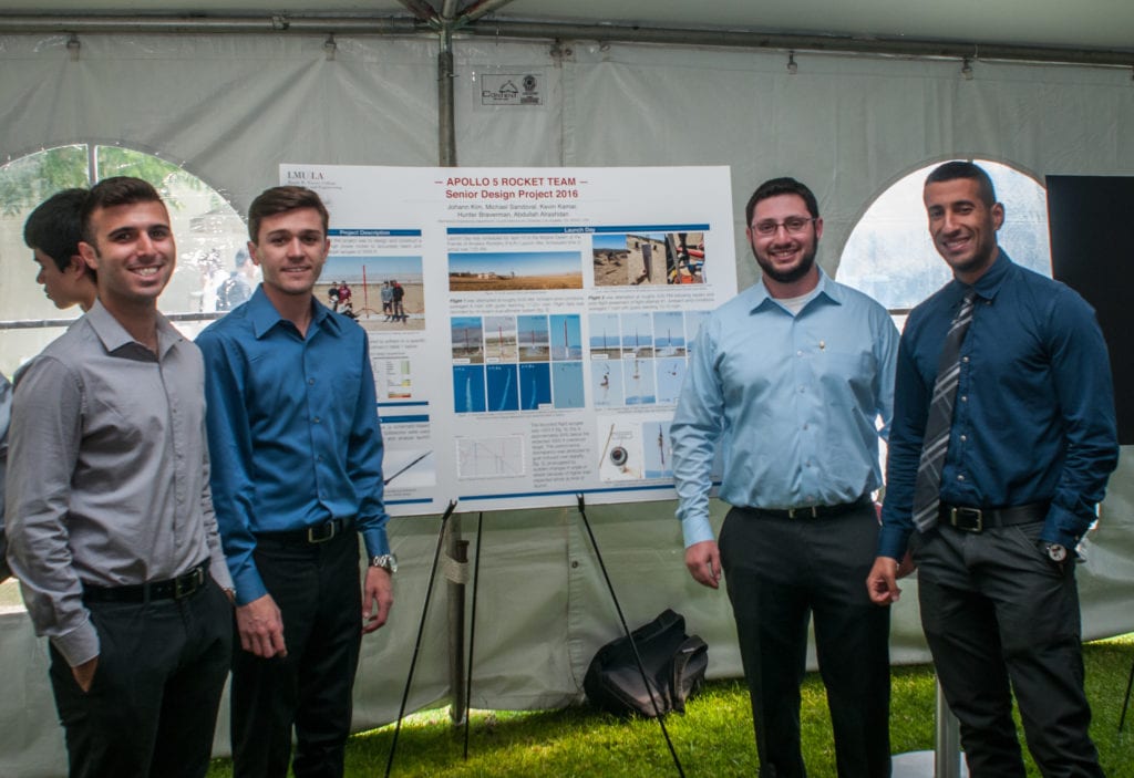 Seaver students and their Capstone Project poster