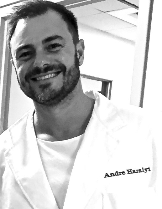 Andre Haralyi wearing a lab coat
