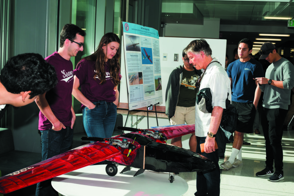 Seaver students showcasing their airplane prototype