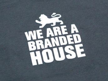 "We are a branded house" t-shirt text