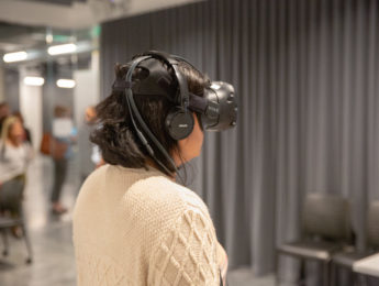 Woman wearing VR goggles