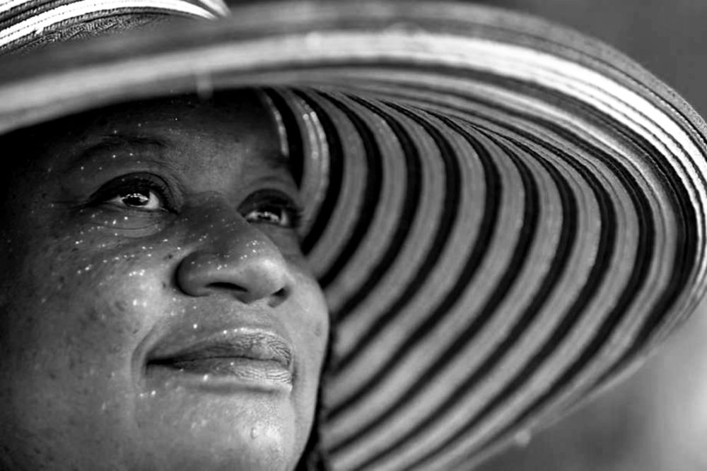 Judy Juanita up close with large hat