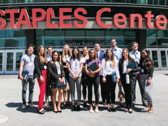 Students standing in front of the Staples Center