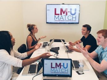 Students working on LM-U Match