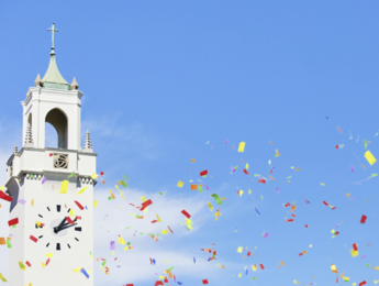 Sacred Heart Chapel clocktower amidst confetti