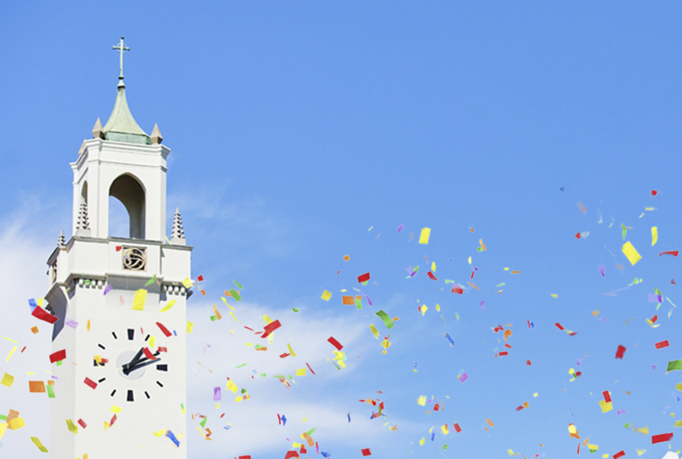 Sacred Heart Chapel clocktower amidst confetti
